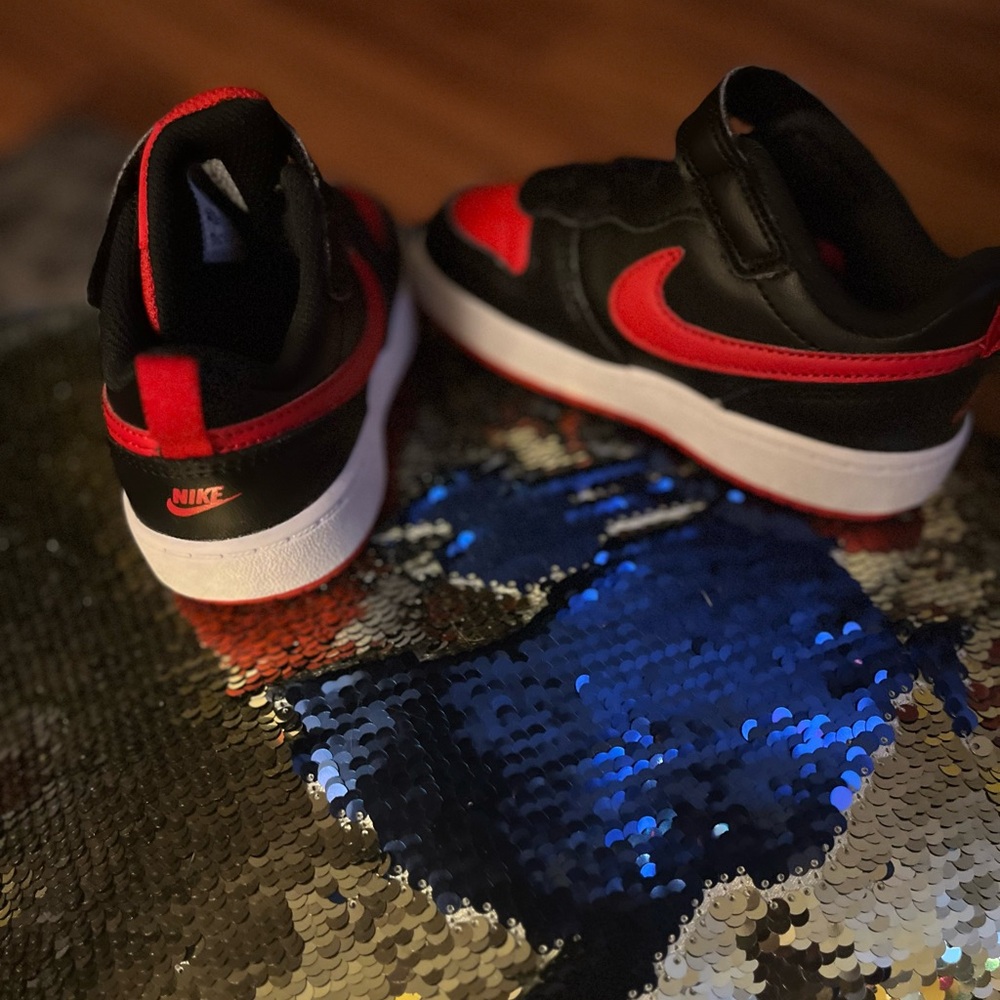 Red and black toddler Nike sneakers. Size 8/8C